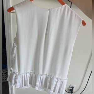 sleeveless blouse with ruffles . like new . size XS/ S